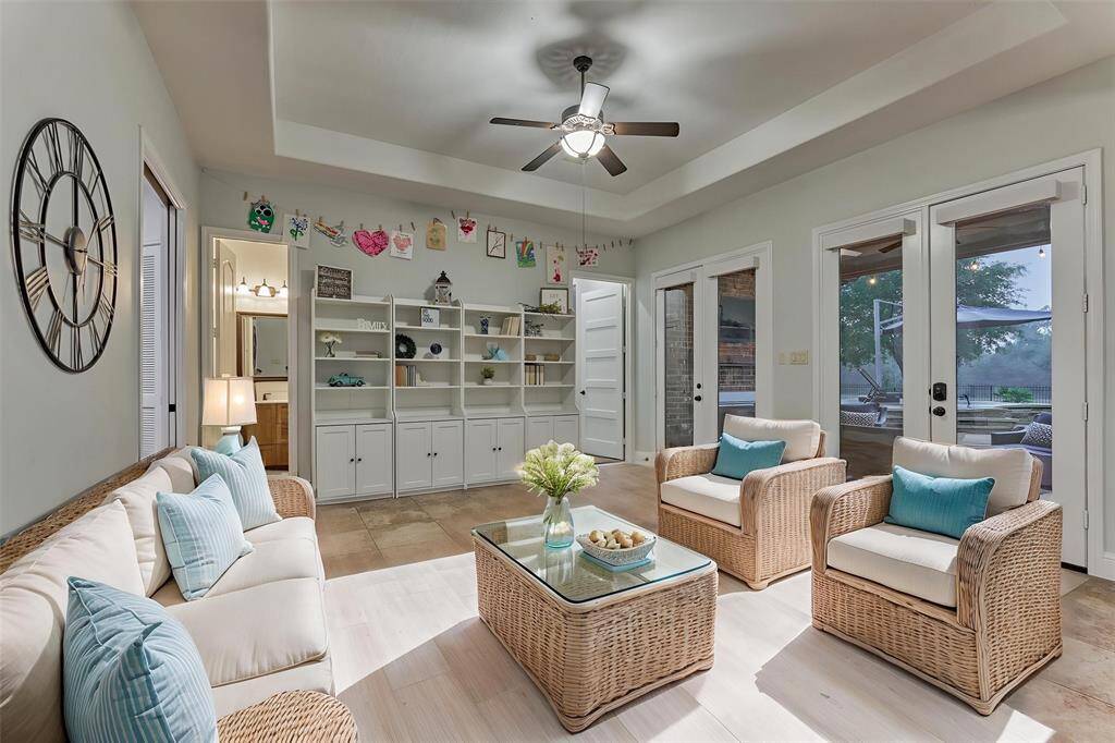 This room is close to kitchen and breakfast room and accross from  the media room. It is a perfect flex space that serves as a sun room or sitting area, additional game room or a pool table room with bar would be great too!