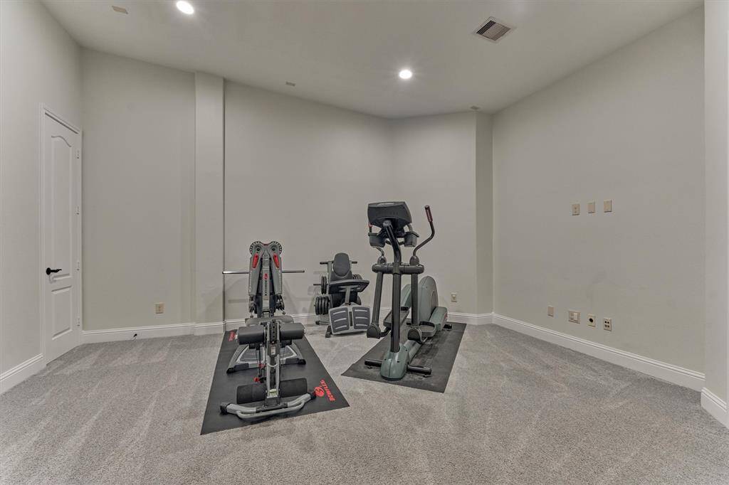 Theatre/ Media room offers closet, and is prewired for surround sound speakers, projector and screen.