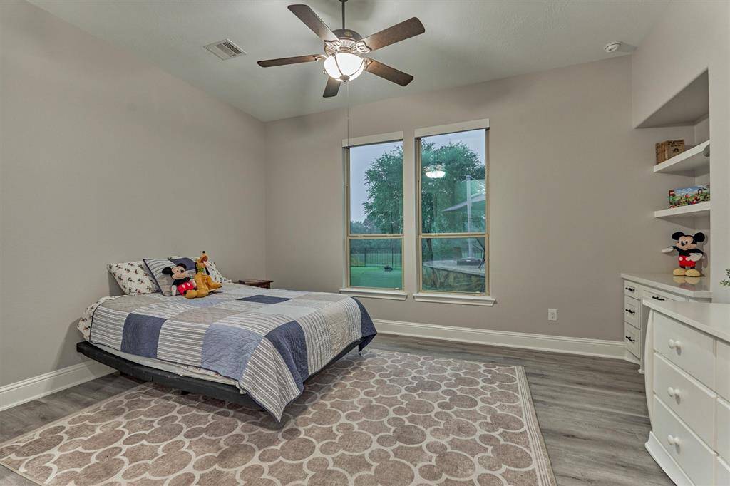 This secondary bedroom is also located downstairs and is also very spacious and offers an en-suite bathroom.  This accessible layout has wide doorways suitable for wheelchairs.