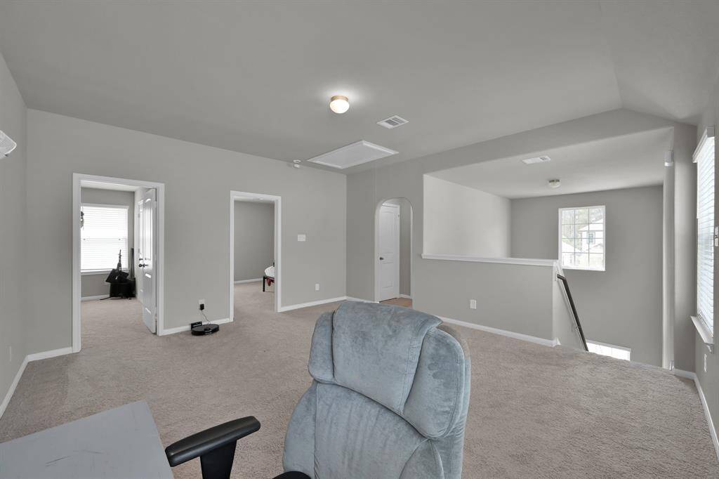 Versatile upstairs flex space or second living area.