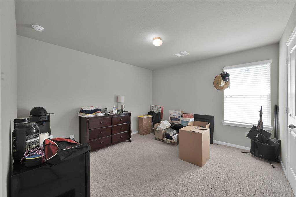 pacious secondary bedroom.