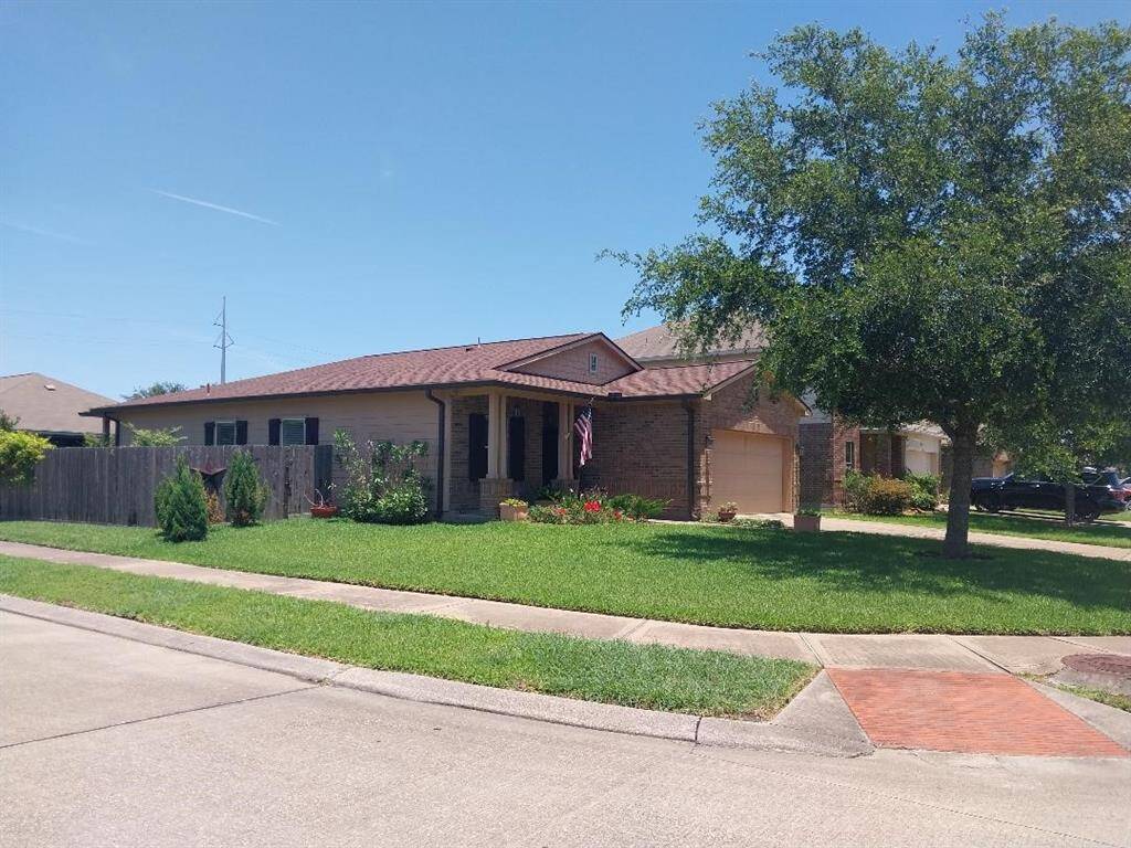 Beautifully maintained, move-in ready home with lush landscaping and inviting curb appeal. Perfect for your next chapter !Decorative but dual storm shutters