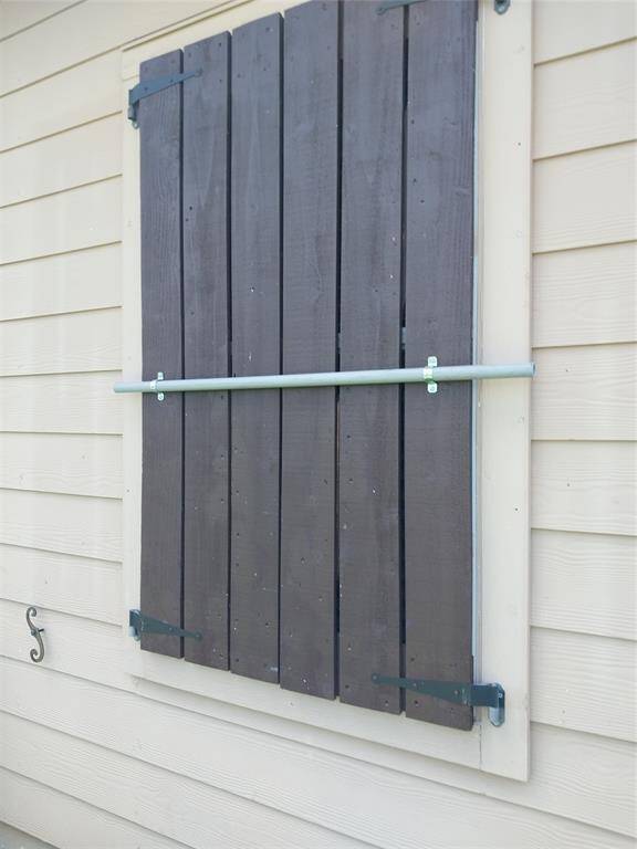 Custom made storm shutters