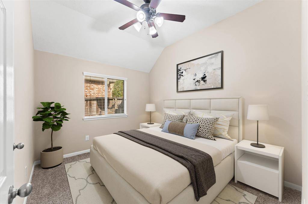 The second bedroom is full of possibilities, waiting to be filled with laughter, dreams, and memories. Plush carpeting adds an extra layer of comfort, making every step feel soft and cozy.