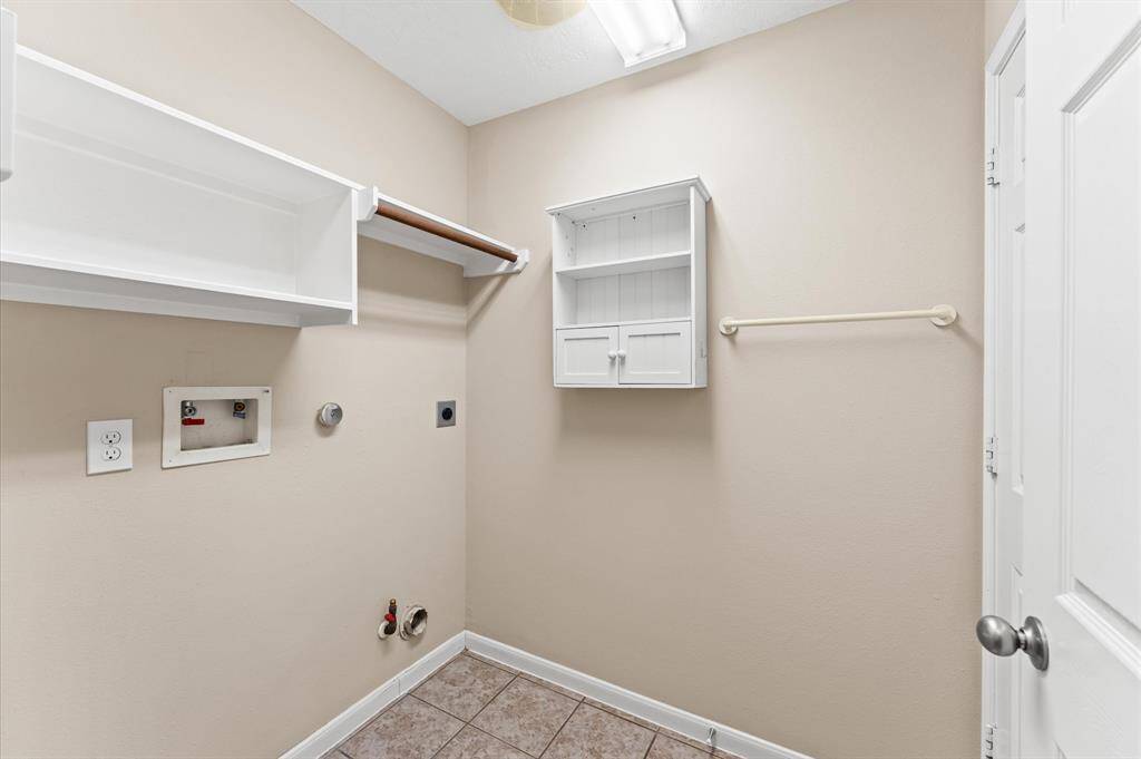 The laundry area is a dedicated space designed for ease and efficiency. The perfect blend of practicality and convenience, making chores a little easier.