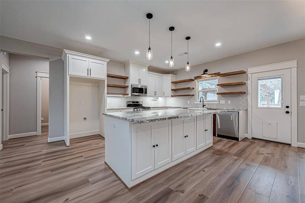 8' long kitchen island with ample storage.