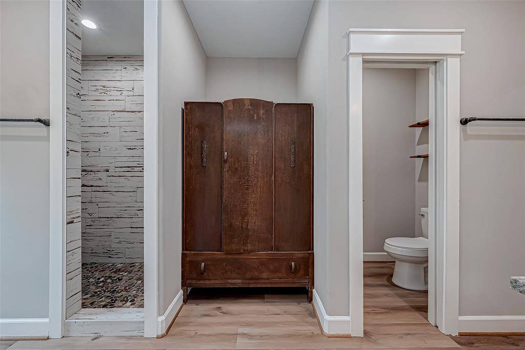 A dedicated linen armoire for all your towels and bedding.