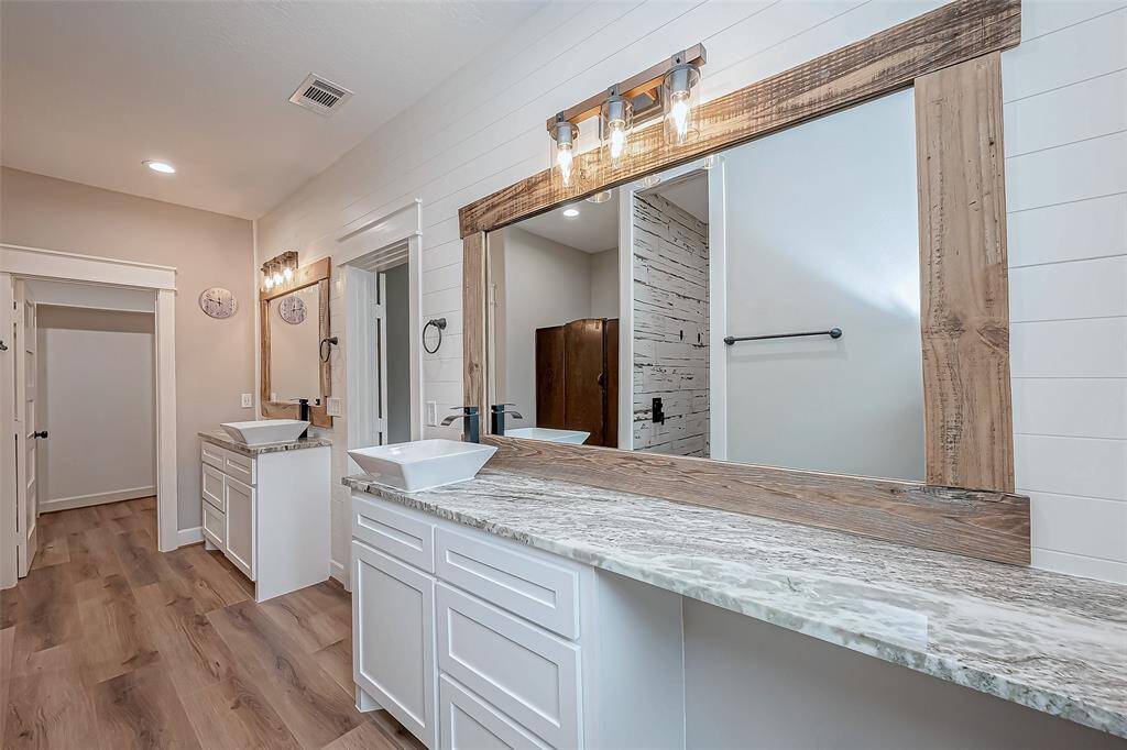 Bright & Beautiful! Enjoy tons of natural light and brand-new cabinets in this space.