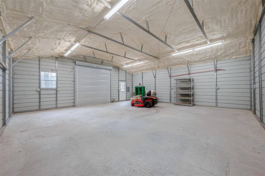 This metal shop is foam insulated and has its own electric circuit.