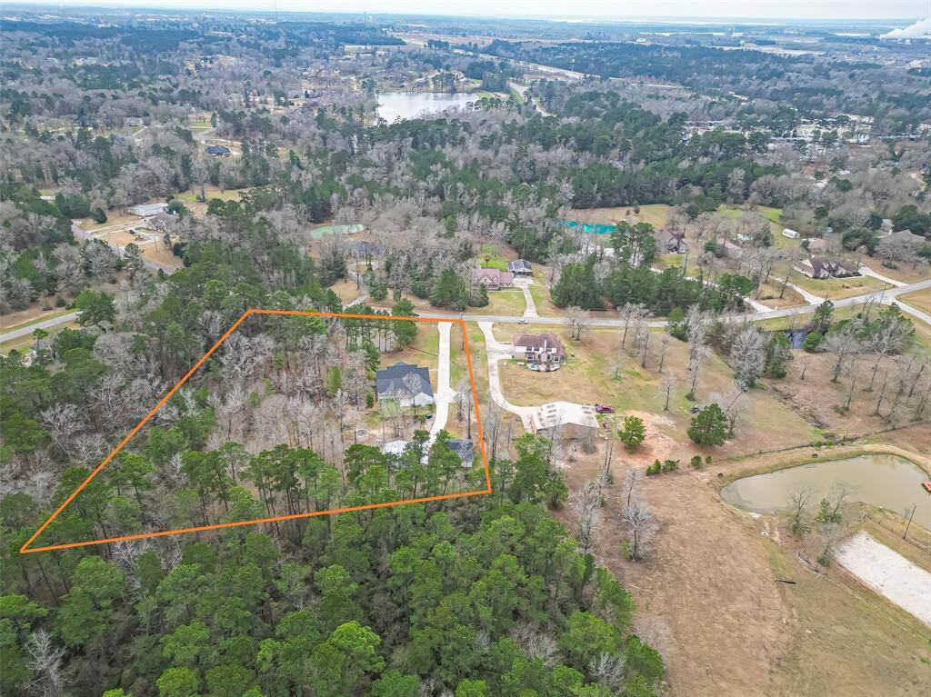Room to breathe, with over 4 acres of wooded land.