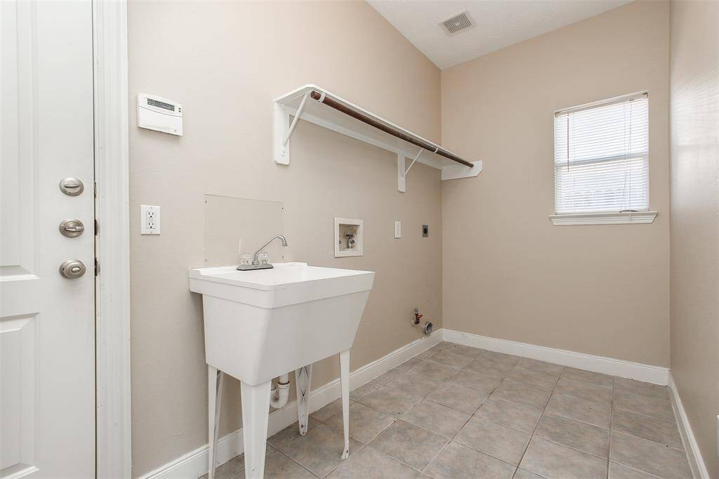 Utility room coming in from the garage