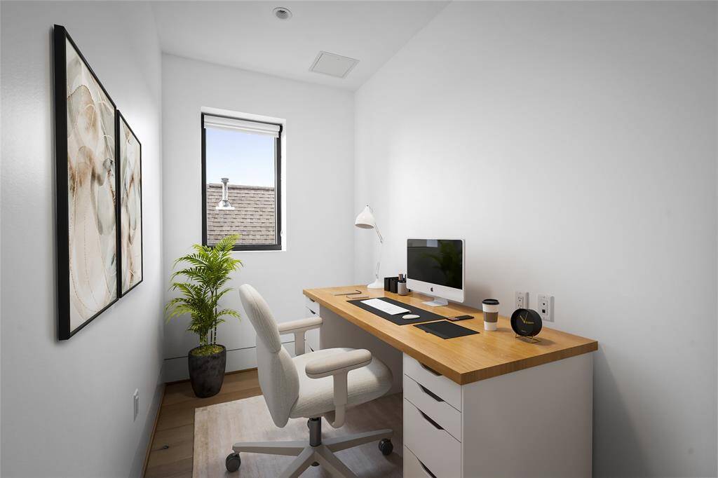 This versatile space can easily be transformed into an office or a dedicated workout area. *Virtual staging has been added*
