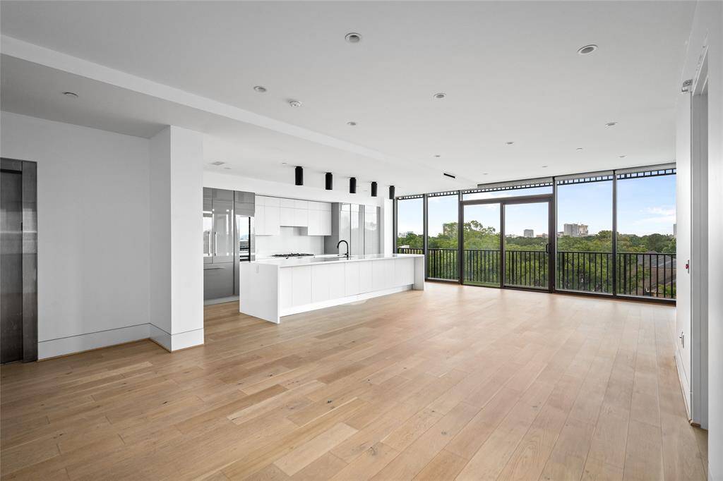 Upon entry, you are welcomed into a spacious and inviting living area.