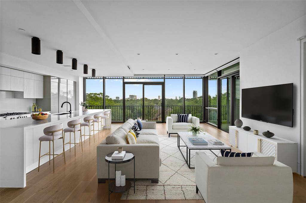 The expansive living area flows effortlessly into the kitchen, providing an elegant setting ideal for both relaxed living and entertaining. *Virtual staging has been added*