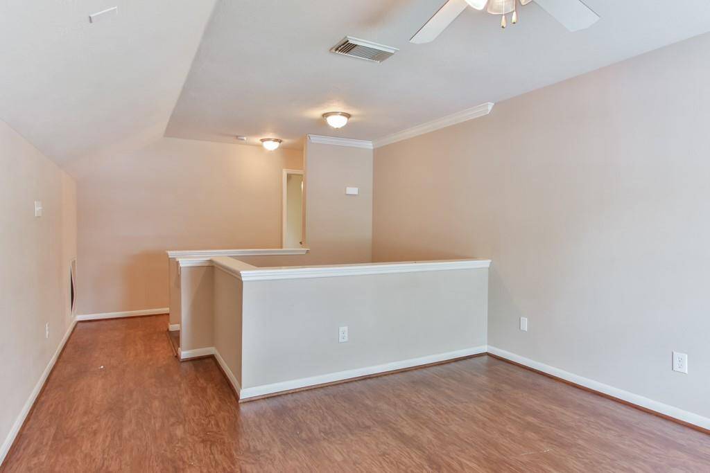 Top of stairs to gameroom
