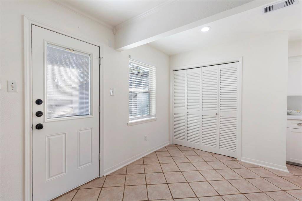 Back door to rear deck and huge back yard.
