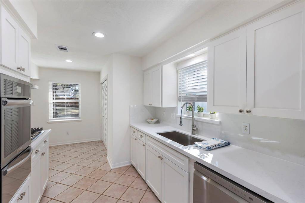 New blinds, backsplash, and lighting, too.