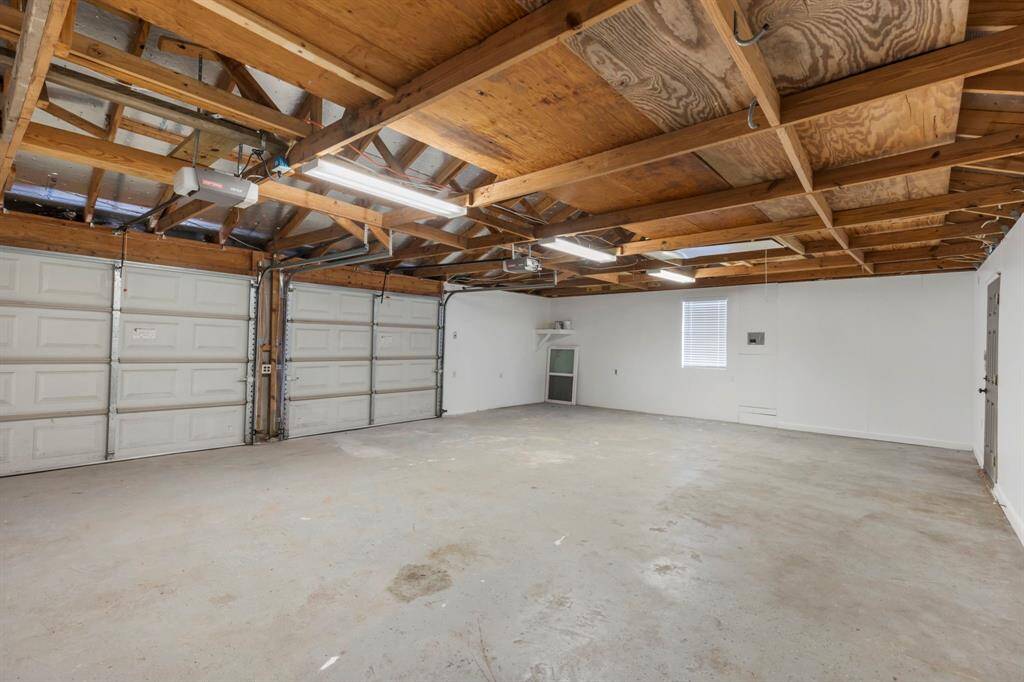 Oversized garage with 2 openers.