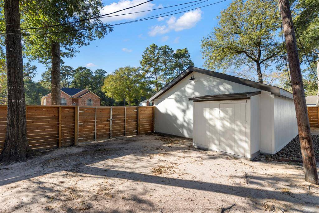 Storage closet attached to garage.