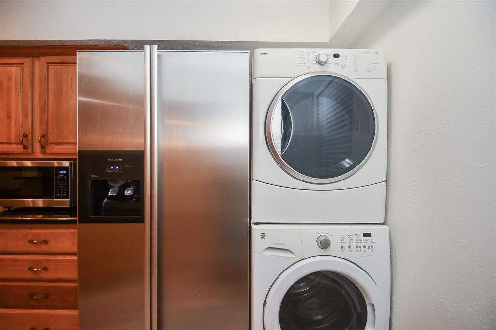 Stainless Steel refrigerator and full-size washer and dryer