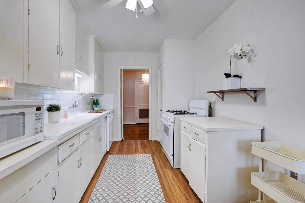 Kitchen (8X13) includes fridge, gas range and pantry. Kitchen adjacent to laundry and mud room.
