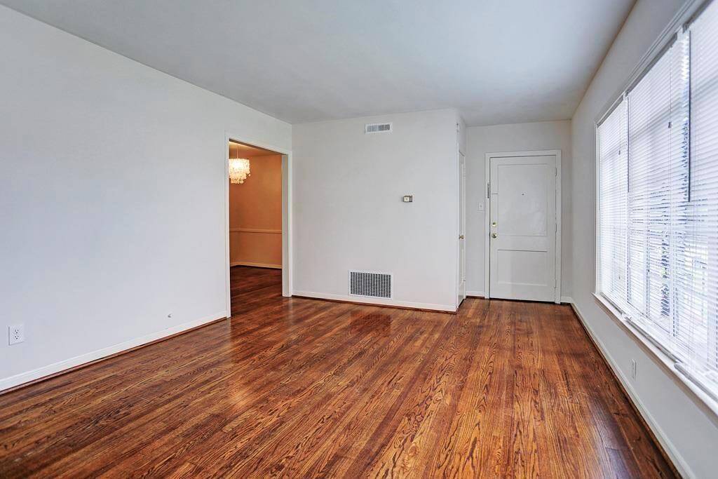 View of living room looking towards entrance. Coat closet as you enter to the right.