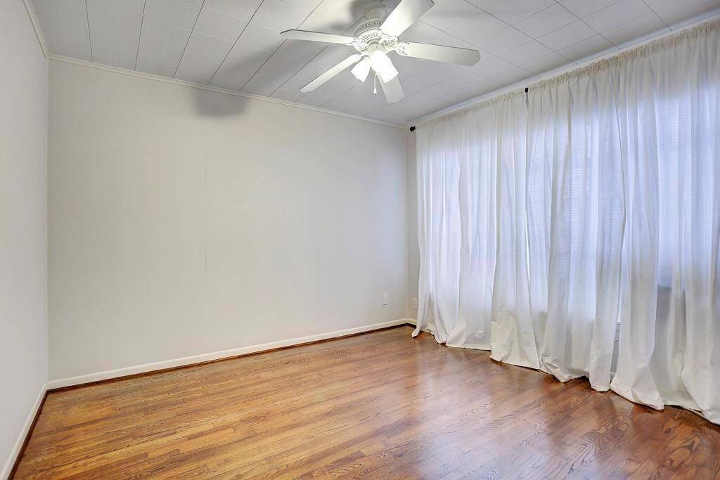 Bedroom #1 (12x11) Has fan, large closet, hardwoods and AC unit.