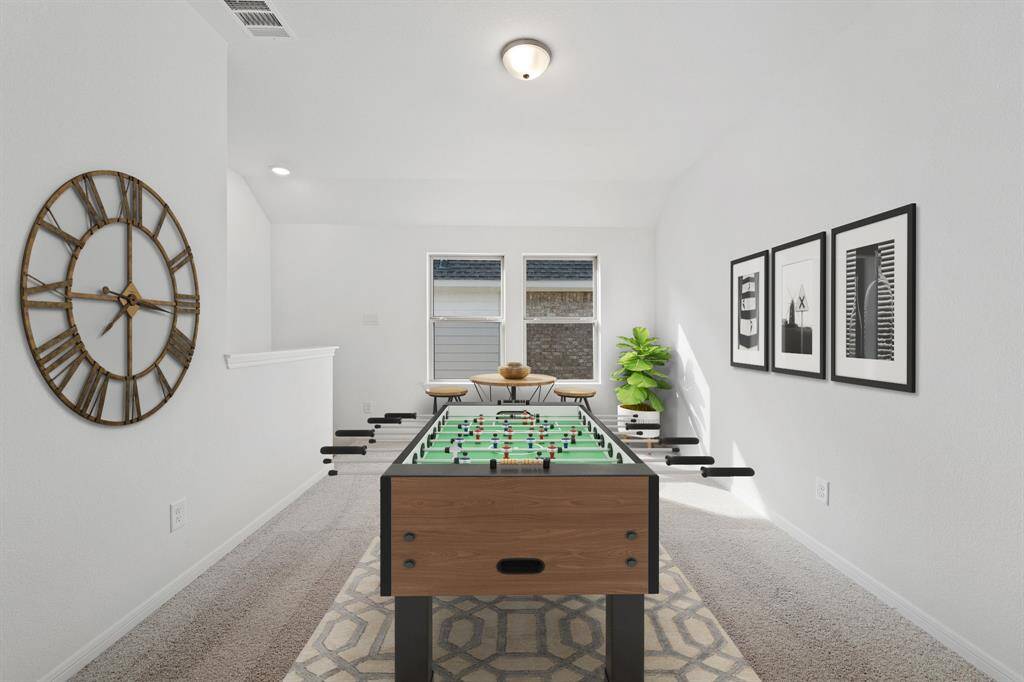 As you make your way upstairs this exceptional game room is a standout feature in this remarkable property, offering a space that combines luxury and fun for all ages.