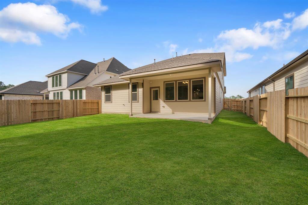 This backyard is perfect for family gatherings, social events, or simply unwinding in the fresh air.