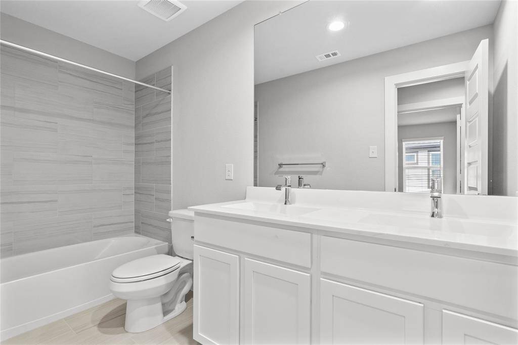 This photo is for illustrative purposes only and is not to be considered an exact replica of the finished home. Rendering does not match the finished product in terms of features, colors, landscaping, etc. Pricing, specifications, square footage and materials are subject to change at any time and without notice.