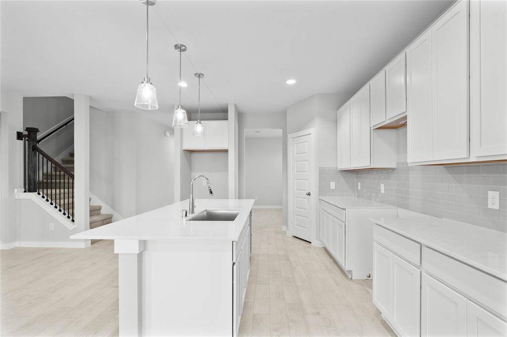 This photo is for illustrative purposes only and is not to be considered an exact replica of the finished home. Rendering does not match the finished product in terms of features, colors, landscaping, etc. Pricing, specifications, square footage and materials are subject to change at any time and without notice.