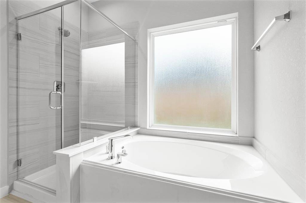 This photo is for illustrative purposes only and is not to be considered an exact replica of the finished home. Rendering does not match the finished product in terms of features, colors, landscaping, etc. Pricing, specifications, square footage and materials are subject to change at any time and without notice.