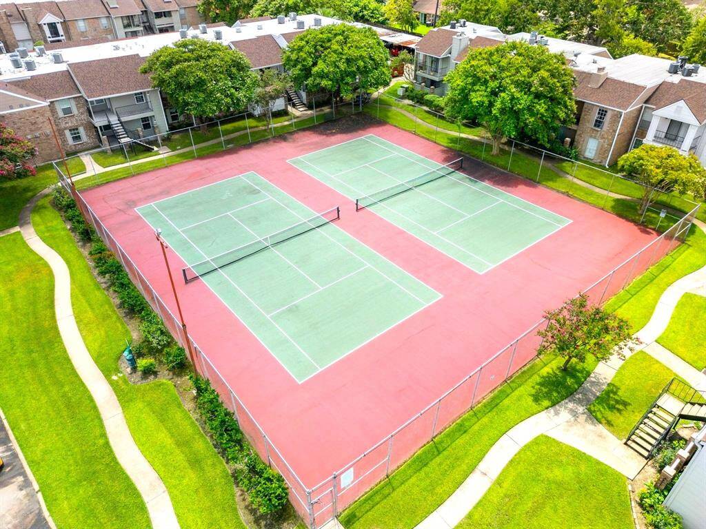 Well-maintained tennis courts offering a great space for recreation and staying active—just steps away from your condo for easy access to outdoor fun.