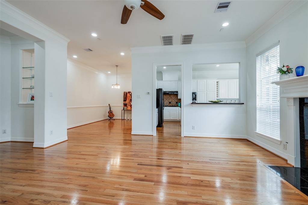 Large first floor Living Room with hardwood floors & gas fire, ceiling fan