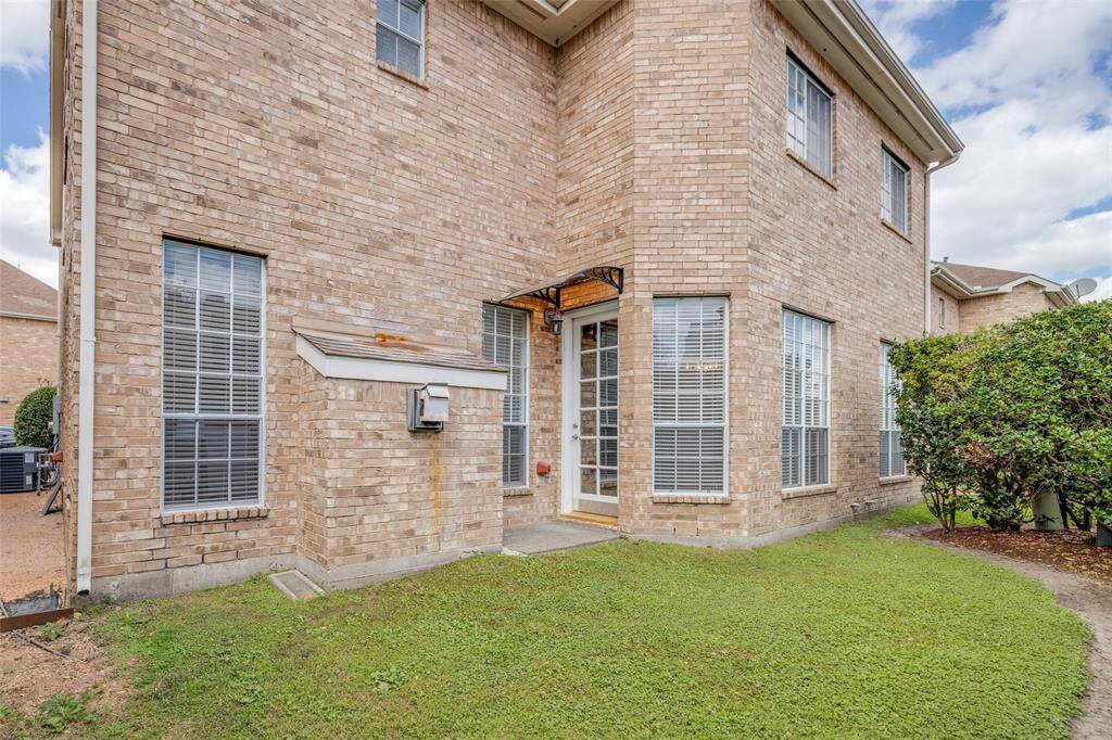 Fabulous back yard with mature landscaping and large grass area