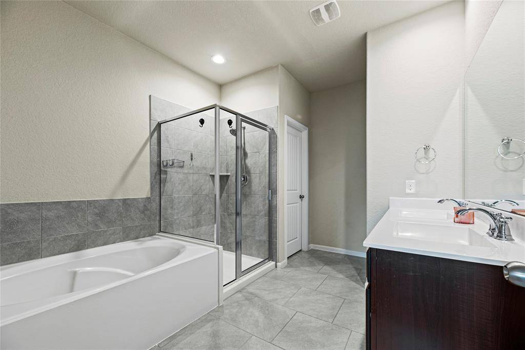 Relax in your deep soaking tub or opt for a quick rinse in the separate shower.