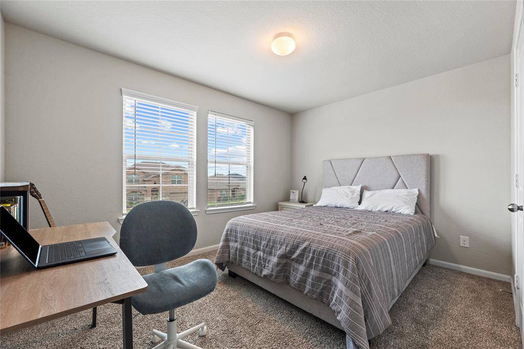 Your third bedroom offers a generous and inviting space that exudes comfort and versatility.