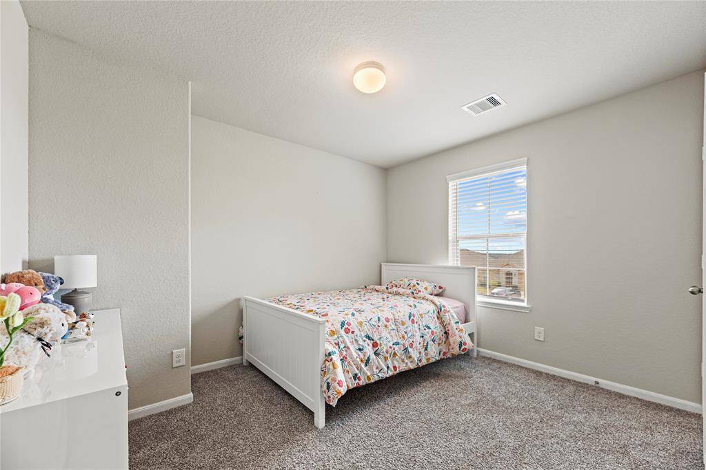 The thoughtfully designed layout of your third bedroom allows for natural light to flood the room, creating a warm and welcoming atmosphere.