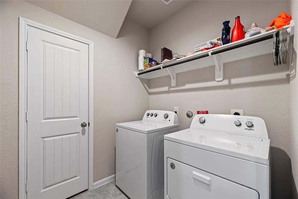 Experience convenience with the in-house utility room, thoughtfully designed with a dedicated laundry area.