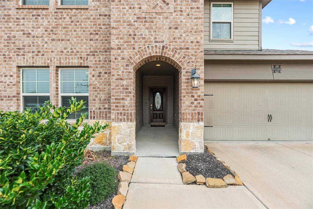 Beautiful stone and brick exterior has great street appeal and combine to create a welcoming atmosphere.