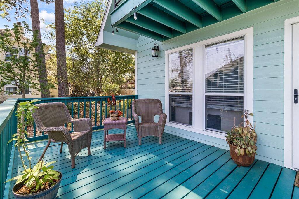 Charming front porch that is wonderful for relaxing and enjoying the surrounding scenes.