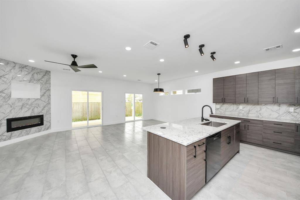 Spacious open conceept. The electric fireplace is such a nice ambience.