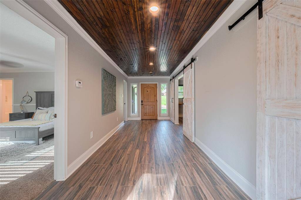 This stunning entryway invites you to explore the rest of the home, blending style with practicality. It’s the perfect first impression for guests and a welcoming space to start and end your day.
