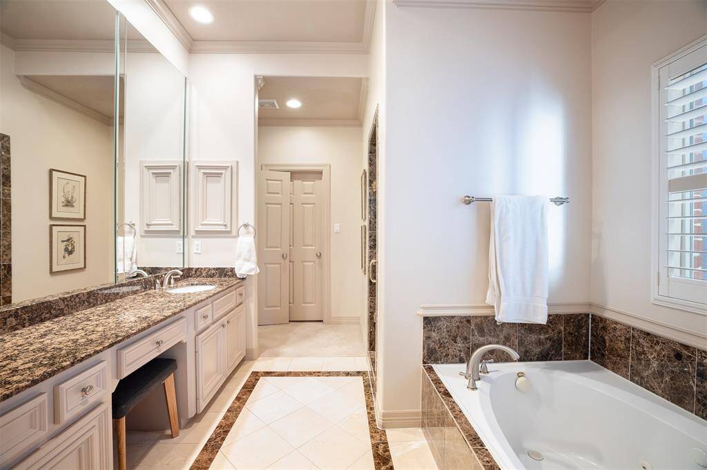 The island kitchen is designed for the ease of meal preparation. The red oak hardwood floors continue into the living spaces. Don't miss the beautiful millwork throughout this traditional home, built in 2000 and wonderfully maintained by the Landlord.