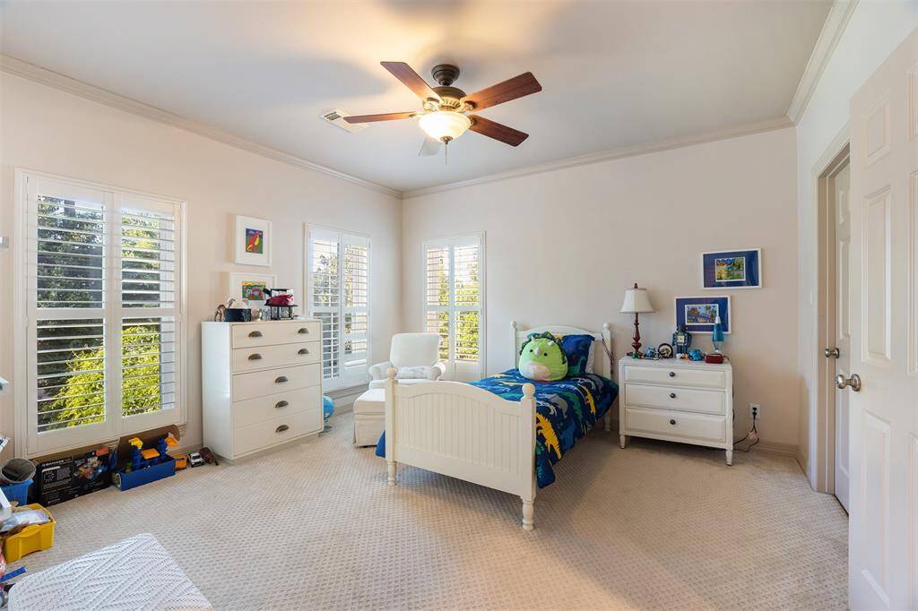 This view of the backyard highlights the abundant green space. Plenty of room to play!
