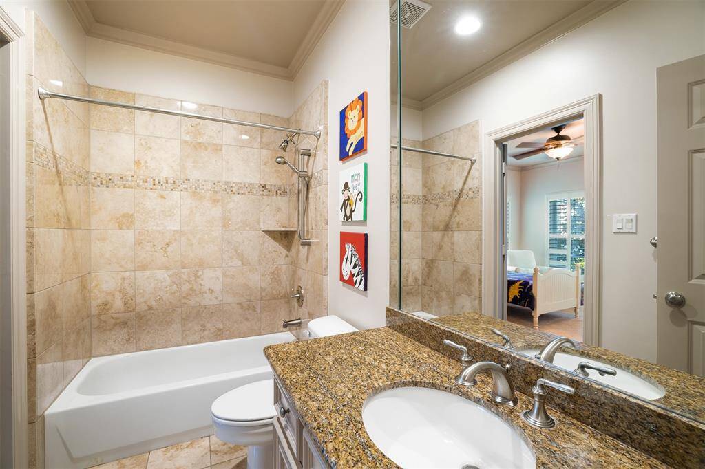 Generously-sized primary bedroom, which offers a full-sized lounging area.