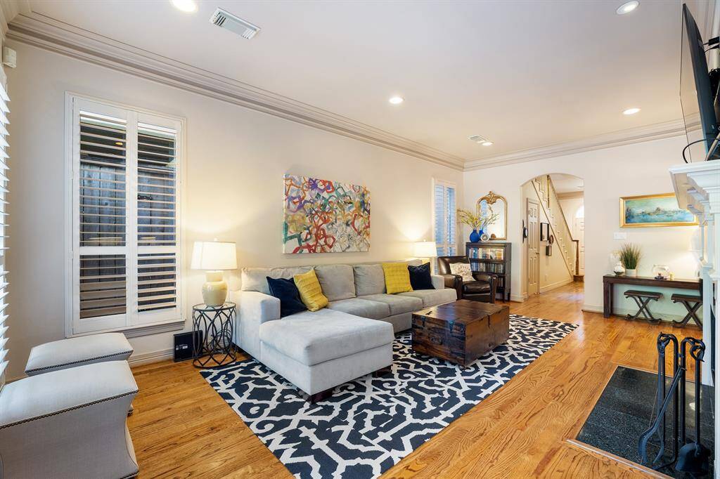 Lovely living room complete with floor-to-ceiling windows.