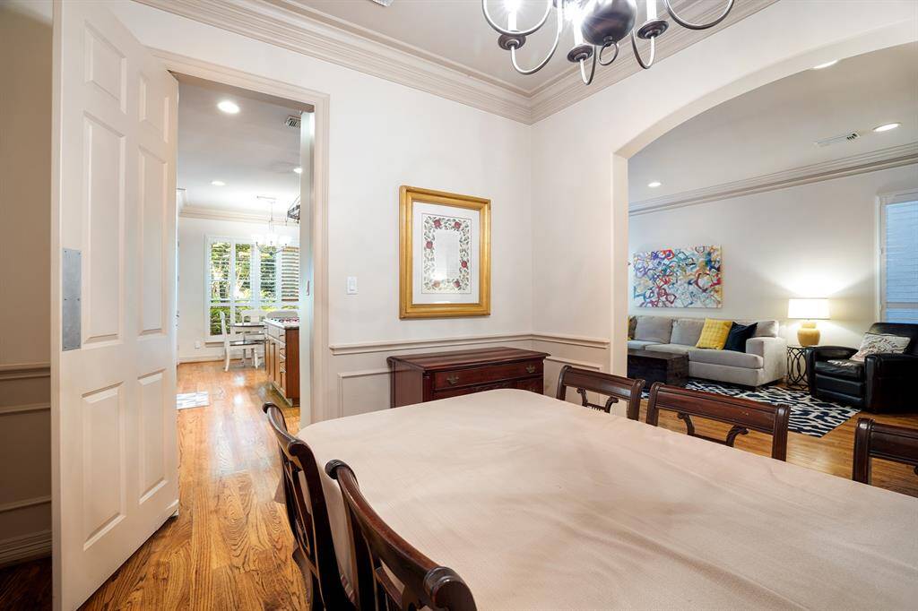 The living room overlooks the handsome patio and backyard from the French doors and windows shown in the previous photo.