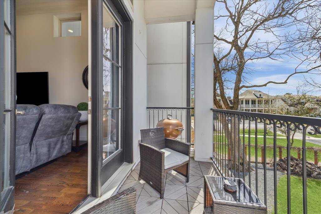 Outdoor patio offers room for a grill and sitting area.