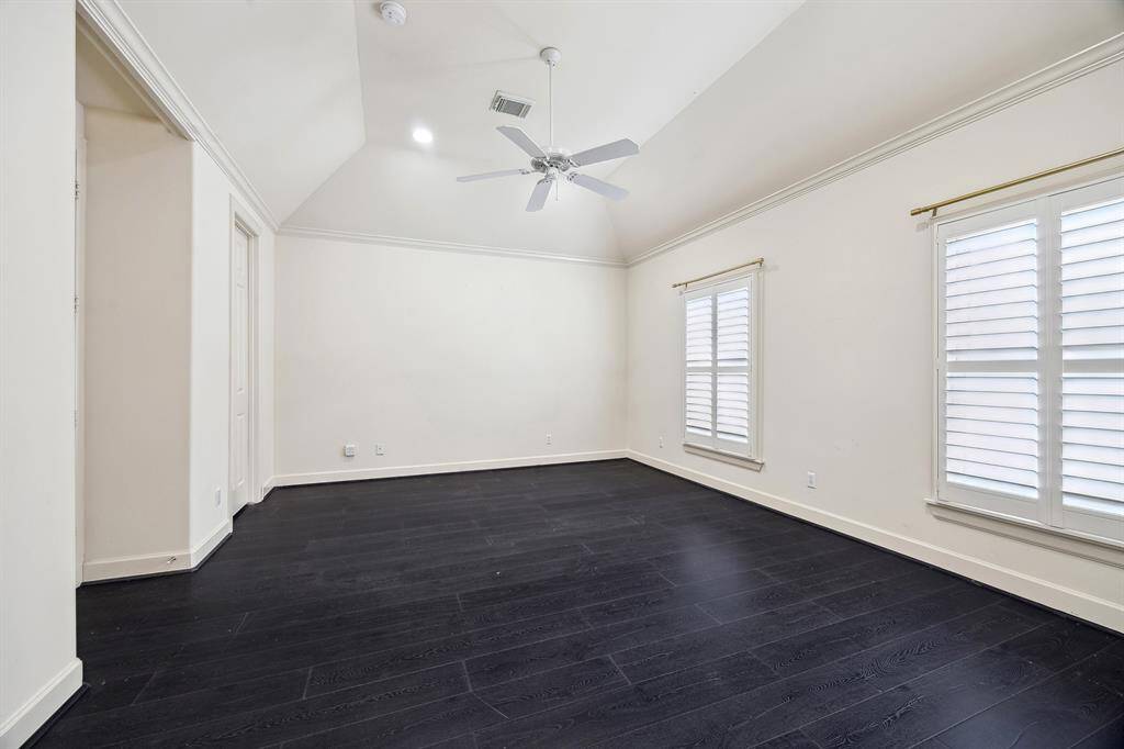 Another view of the primary bedroom